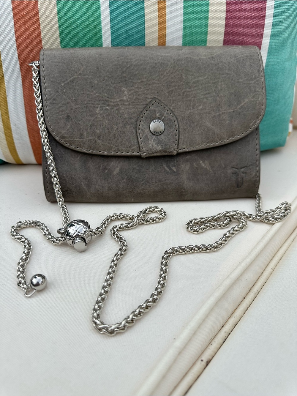 FRYE Grey Leather cross body with adjustable silver colored chain.